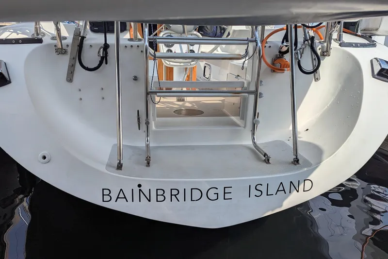 Slide: The Image of Stern view of 1995 Catalina 36 MkII sailboat with "Bainbridge Island" text. - 10