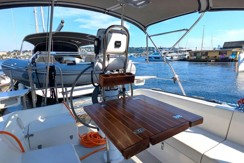 Slide: The Image of Cockpit view of a 1995 Catalina 36 MkII sailboat docked at a marina. - 13
