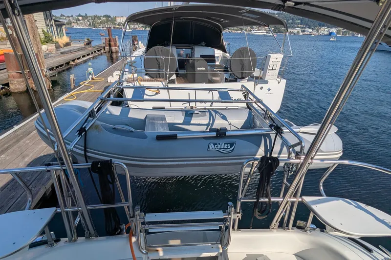 Slide: The Image of Catalina 36 MkII 1995 sailboat with dinghy docked at marina. - 16