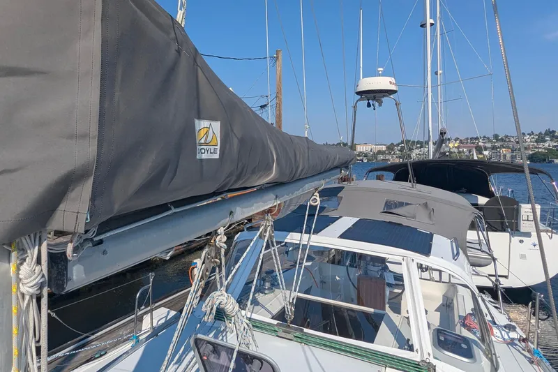 Slide: The Image of Sailboat Catalina 36 MkII 1995 docked, featuring Doyle sail cover, sunny marina background. - 7