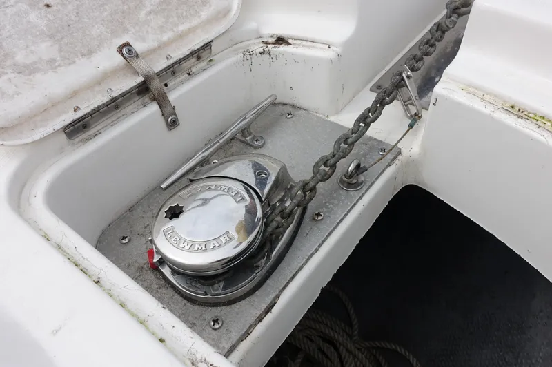 Slide: The Image of Anchor windlass on 2001 Silverton 410 Sport Bridge boat deck. - 4