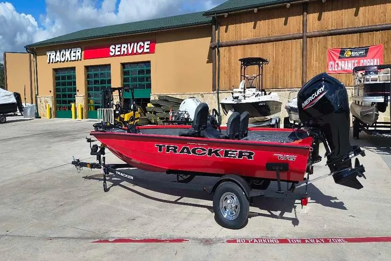 Slide: The Image of 2026 Tracker Pro Team 175 Crappie Edition boat in dealership lot, rear view. - 3