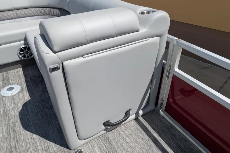 Slide: The Image of 2025 Ranger Reata 220FC boat interior with gray seating and cup holder. - 9