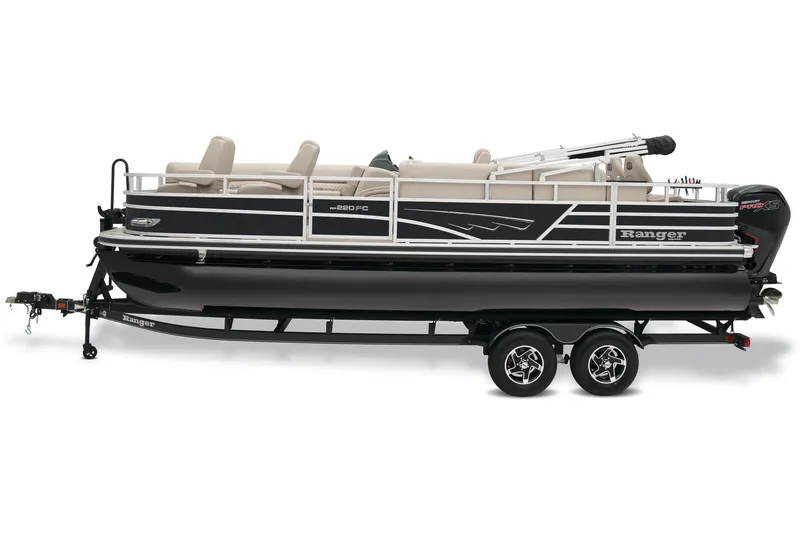 Slide: The Image of 2025 Ranger Reata 220FC boat dashboard with steering wheel and controls. - 4