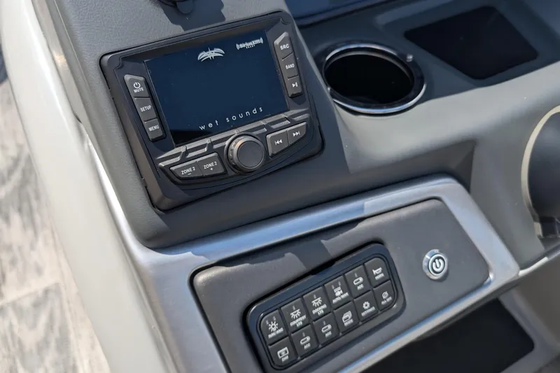 Slide: The Image of Dashboard of 2025 Ranger Reata 220FC featuring Wet Sounds audio system and control panel. - 10