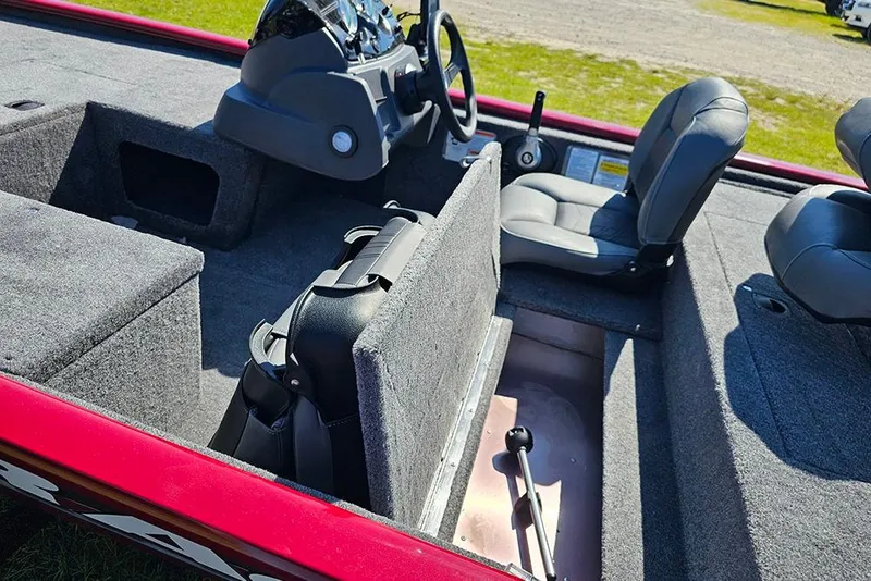 Slide: The Image of 2026 Tracker Pro 170 boat interior with seating and steering console. - 11