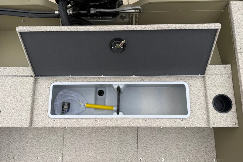 Slide: The Image of Open storage compartment in 2026 Lund 1675 Alaskan SS boat with fishing net inside. - 24