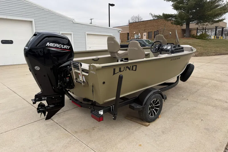 Slide: The Image of 2026 Lund 1675 Alaskan SS boat with Mercury engine on a trailer. - 5