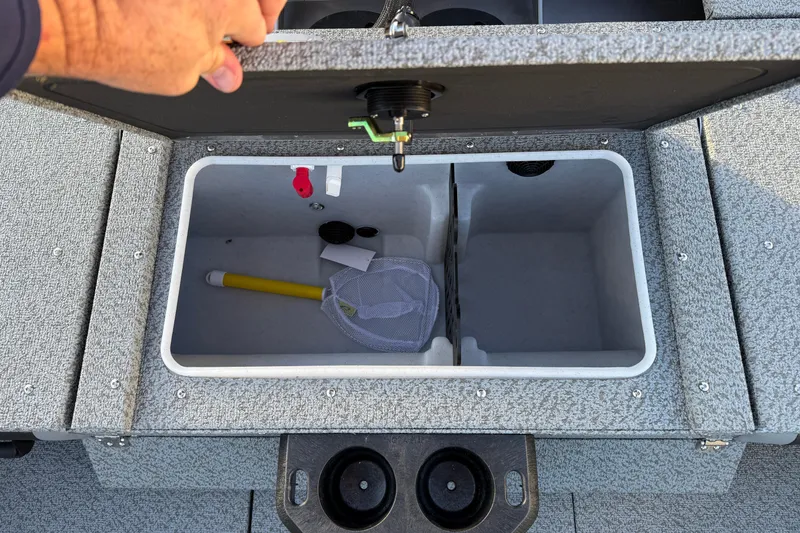 Slide: The Image of Open storage compartment in 2026 Lund 1875 Impact XS Sport boat. - 31