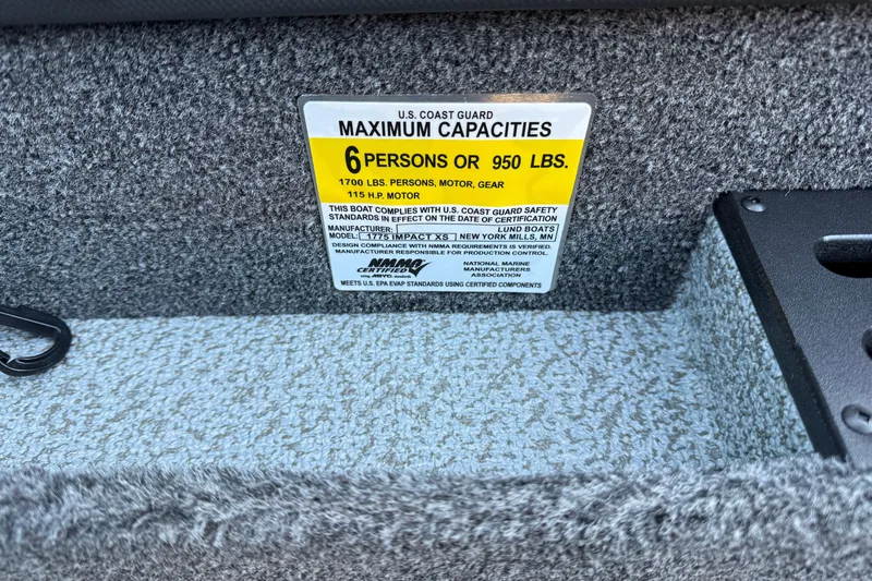 Slide: The Image of 2026 Lund 1775 Impact XS Sport boat capacity label, 6 persons or 950 lbs. - 25