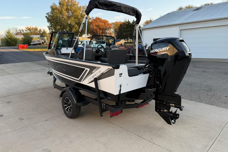 Slide: The Image of 2026 Lund 1775 Impact XS Sport boat with Mercury engine on trailer. - 5