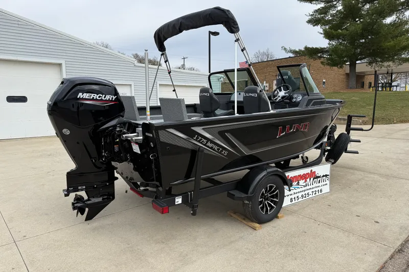 Slide: The Image of 2026 Lund 1775 Impact XS Sport boat with Mercury engine on trailer. - 6