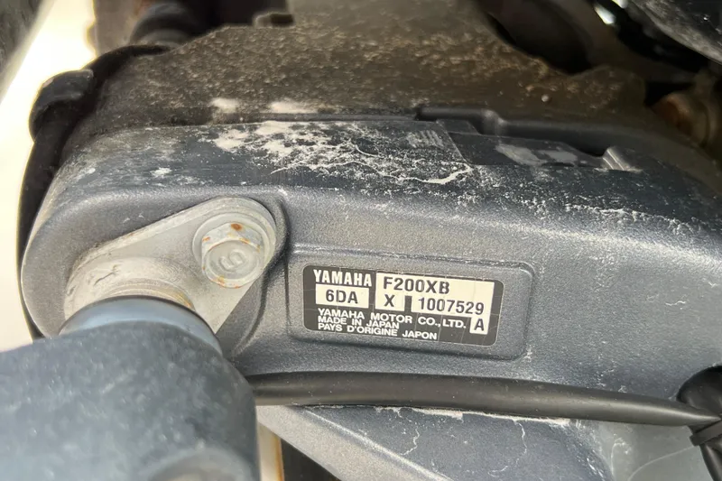 Slide: The Image of Yamaha F200XB engine detail on 2015 Robalo R227 Dual Console boat. - 52