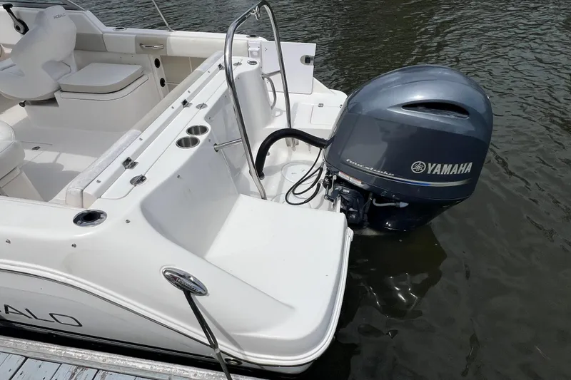 Slide: The Image of 2015 Robalo R227 Dual Console boat with Yamaha outboard motor on water. - 9