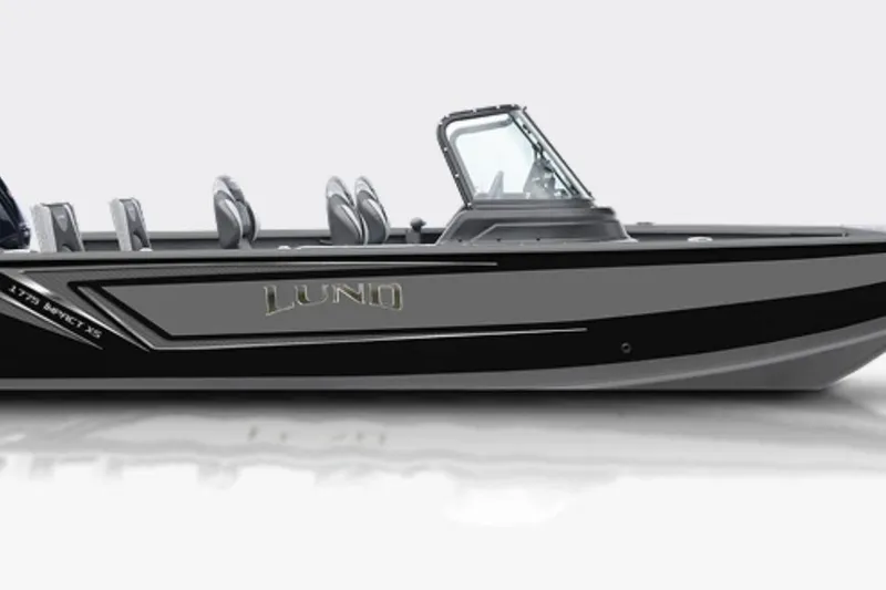 The Image of 2026 Lund 1775 Impact XS Sport boat on trailer, parked outside Hennepin Marine. - 0