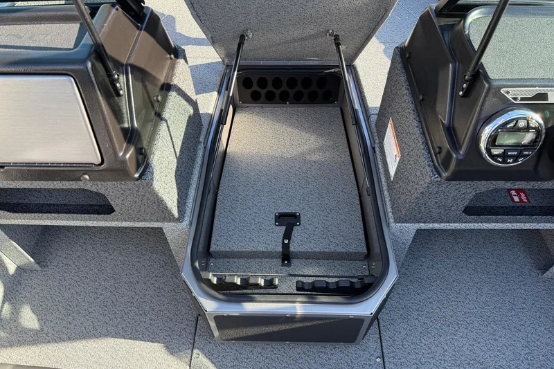 Slide: The Image of 2026 Lund 1775 Impact XS Sport boat interior storage compartment. - 13