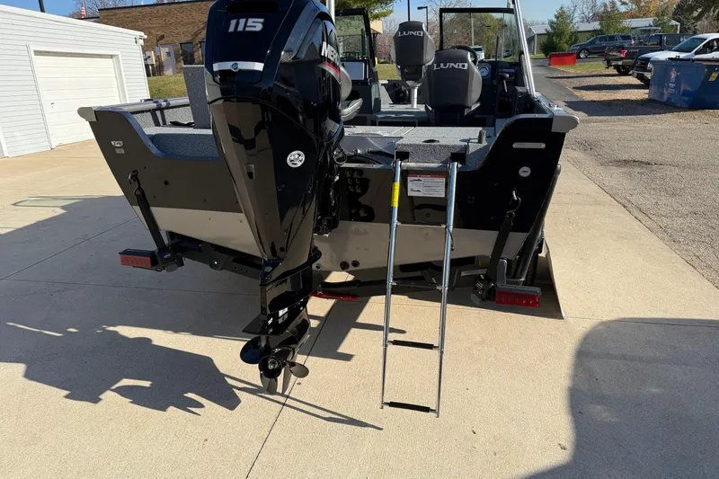 Slide: The Image of 2026 Lund 1775 Impact XS Sport boat with Mercury 115 engine and ladder. - 7