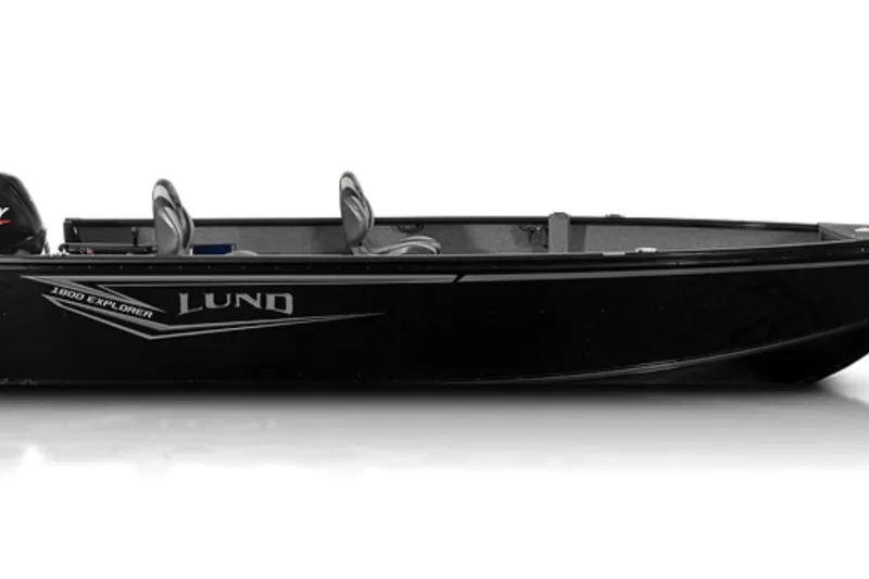 The Image of 2026 Lund 1800 Explorer Tiller boat on trailer, displayed at Hennepin Marine. - 0