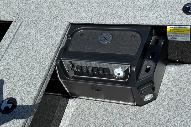 Slide: The Image of Control panel of 2026 Lund 1800 Explorer Tiller boat, featuring switches and gauge. - 18