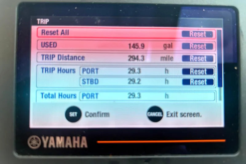 Slide: The Image of Display screen of 2023 Pursuit DC 266 Dual Console showing trip data and fuel usage. - 21