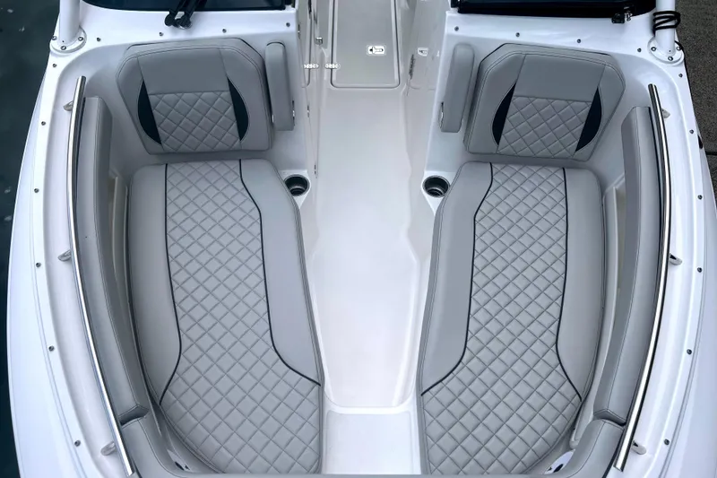 Slide: The Image of 2023 Pursuit DC 266 Dual Console boat interior with luxurious quilted seating. - 28