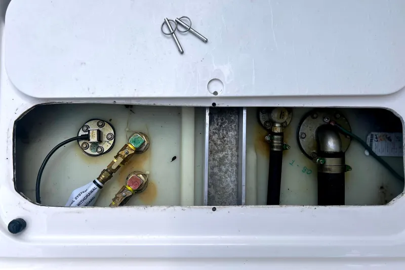 Slide: The Image of 2023 Pursuit DC 266 Dual Console fuel system components and connections. - 34