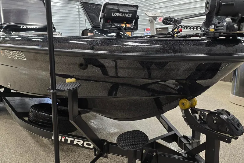 Slide: The Image of 2022 Nitro ZV21 Z-PRO boat on trailer with Lowrance equipment in showroom. - 4