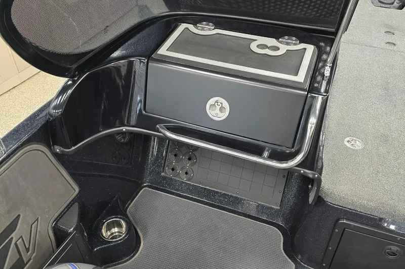 Slide: The Image of 2022 Nitro ZV21 Z-PRO boat interior with storage compartment and sleek design. - 9