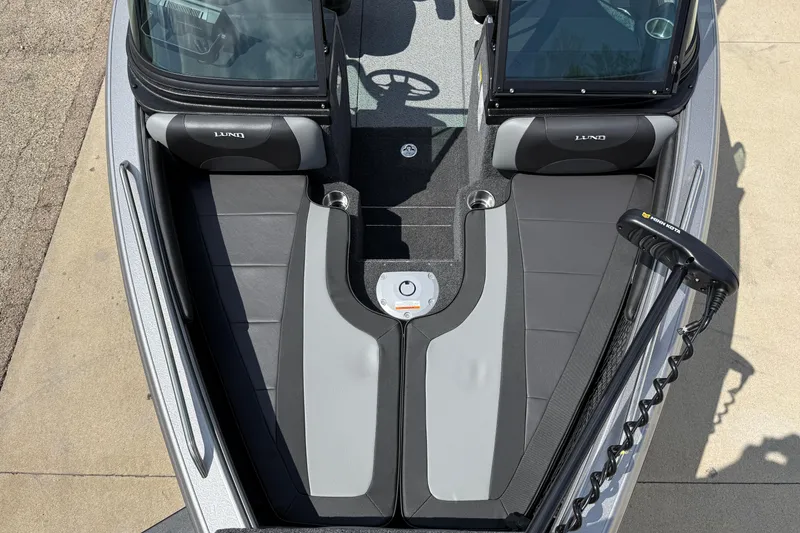 Slide: The Image of 2026 Lund 1975 Tyee boat interior with sleek seating and modern design. - 10