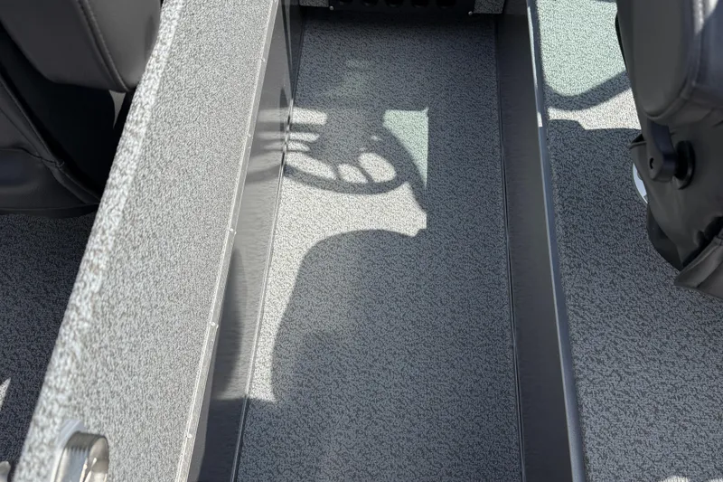 Slide: The Image of Interior view of 2026 Lund 1975 Tyee boat, featuring textured flooring and seating. - 20
