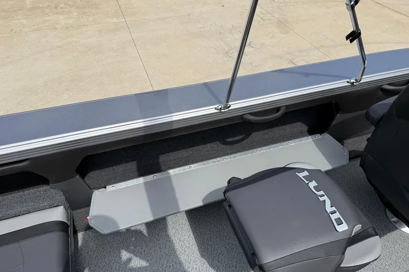 Slide: The Image of 2026 Lund 1975 Tyee boat interior with seating and storage features. - 28