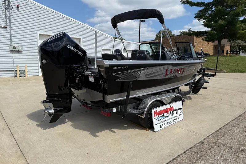 Slide: The Image of 2026 Lund 1975 Tyee boat with Mercury engine on trailer at Hennepin Marine. - 7