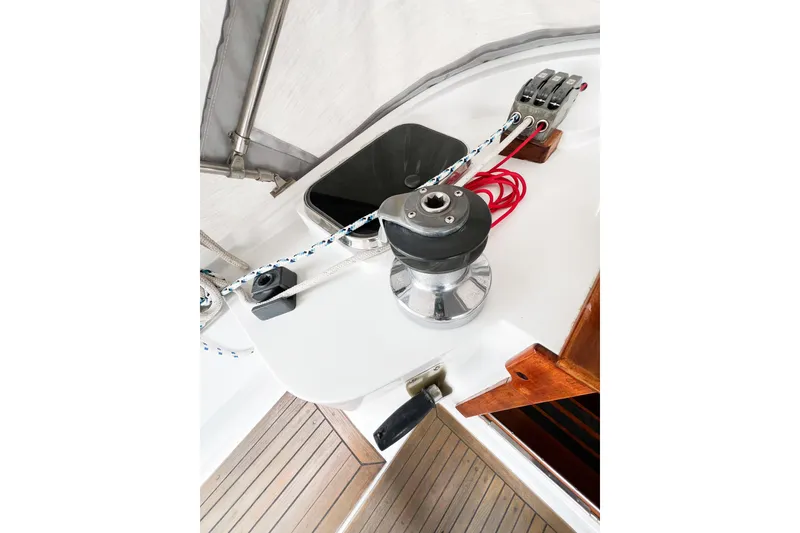 Slide: The Image of Deck view of 1984 Trintella 42 sailboat with winch and ropes. - 16