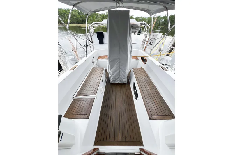 Slide: The Image of Cockpit of 1984 Trintella 42 sailboat with wooden benches and covered helm. - 17