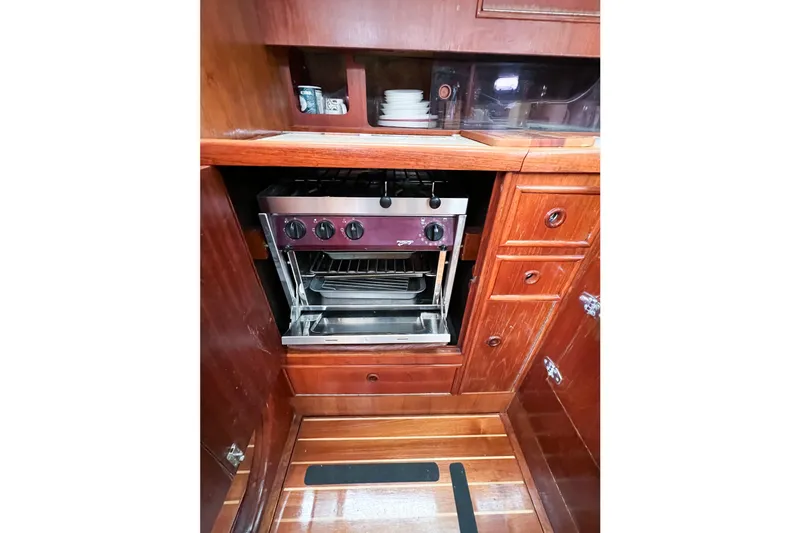 Slide: The Image of Wooden yacht kitchen with built-in oven, Trintella 42, 1984 model. - 59