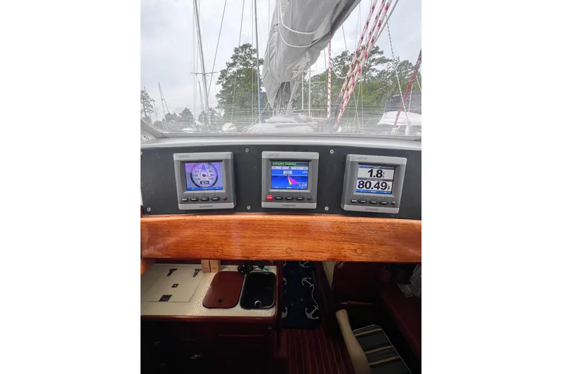 Slide: The Image of Cockpit of 1984 Trintella 42 sailboat with Garmin navigation displays. - 66
