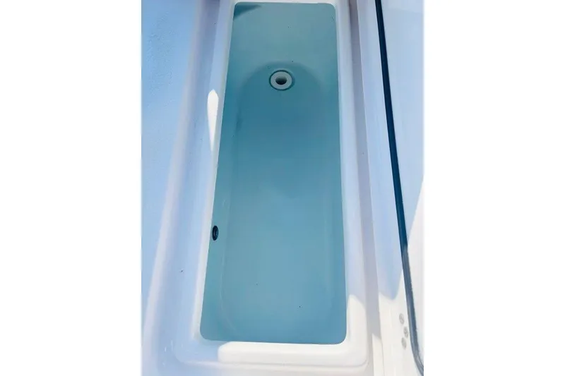 Slide: The Image of Livewell compartment on 2021 Sportsman Masters 227 Bay Boat. - 10
