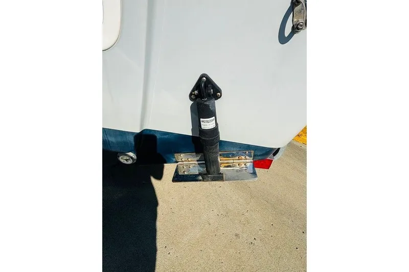 Slide: The Image of 2021 Sportsman Masters 227 Bay Boat trim tab detail in sunlight. - 11