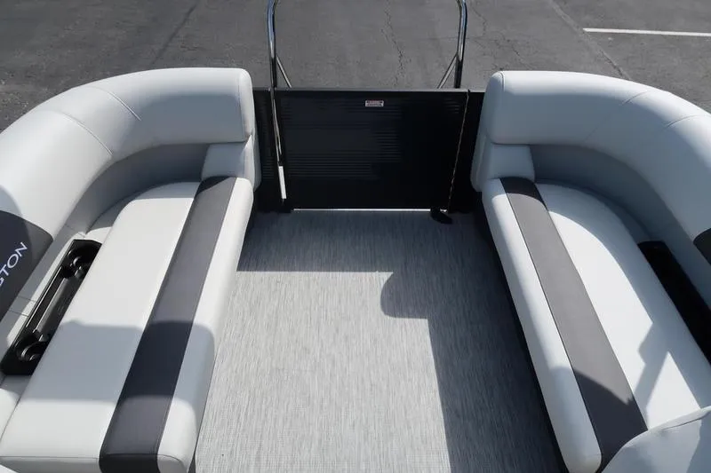 Slide: The Image of 2026 Bennington S Quad Bench 20 SSR interior with gray seating and open deck. - 18