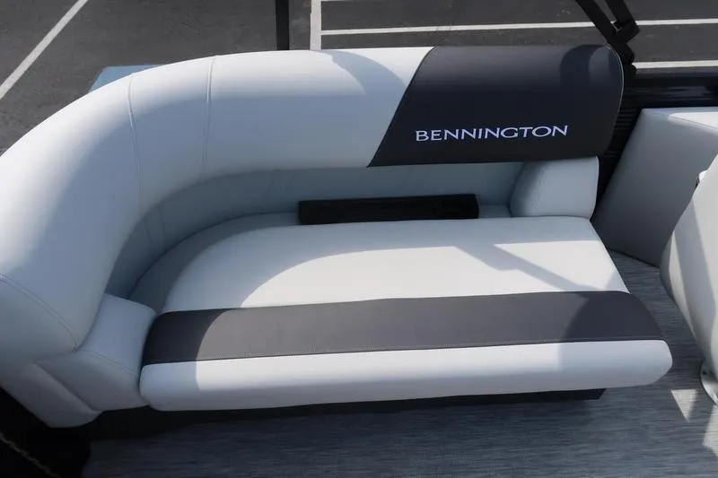 Slide: The Image of 2026 Bennington S Quad Bench 20 SSR boat seat, featuring sleek white and gray design. - 20