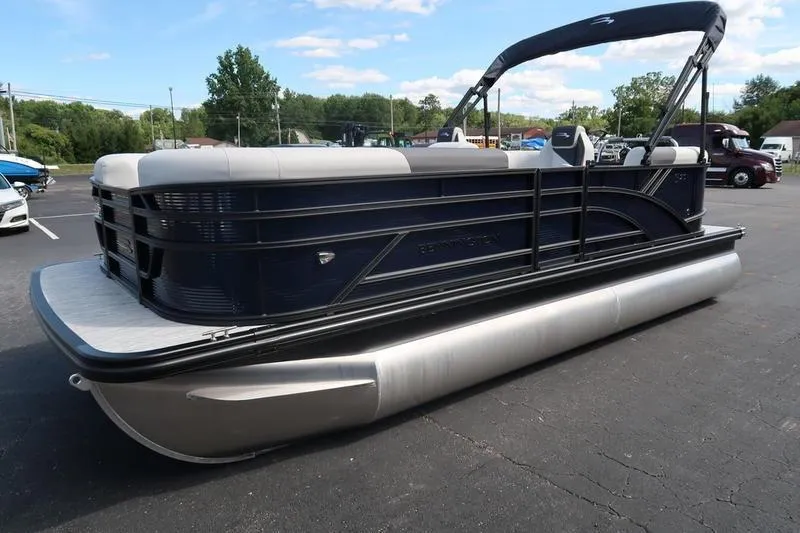 Slide: The Image of 2026 Bennington S Quad Bench 20 SSR pontoon boat in parking lot. - 3