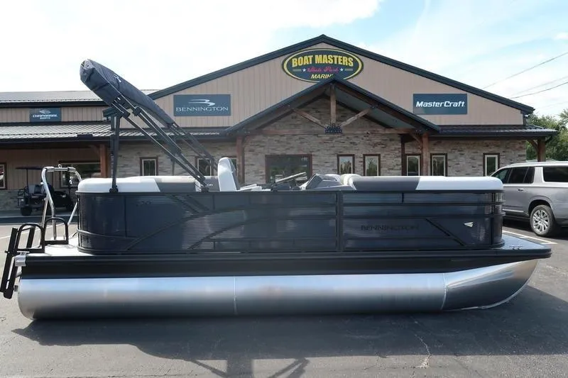 Slide: The Image of 2026 Bennington S Quad Bench 20 SSR pontoon boat at dealership. - 5