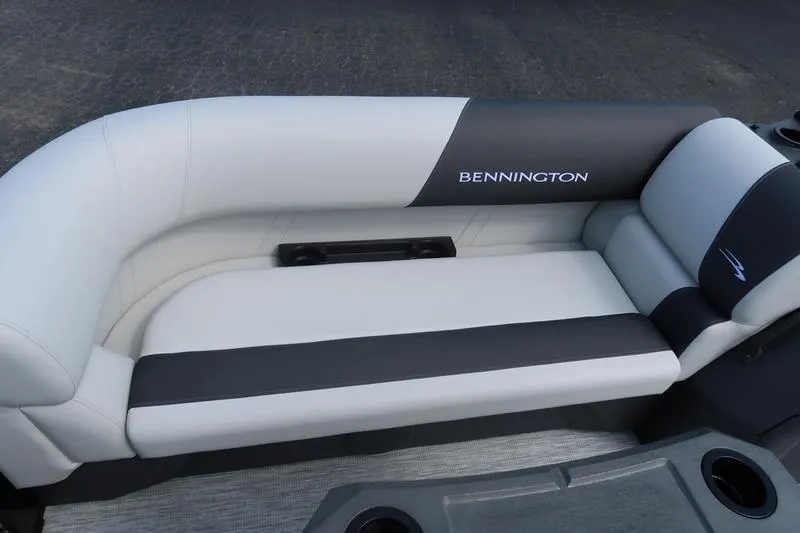 Slide: The Image of 2026 Bennington S Quad Bench 20 SSR boat seating, featuring sleek black and white upholstery. - 9