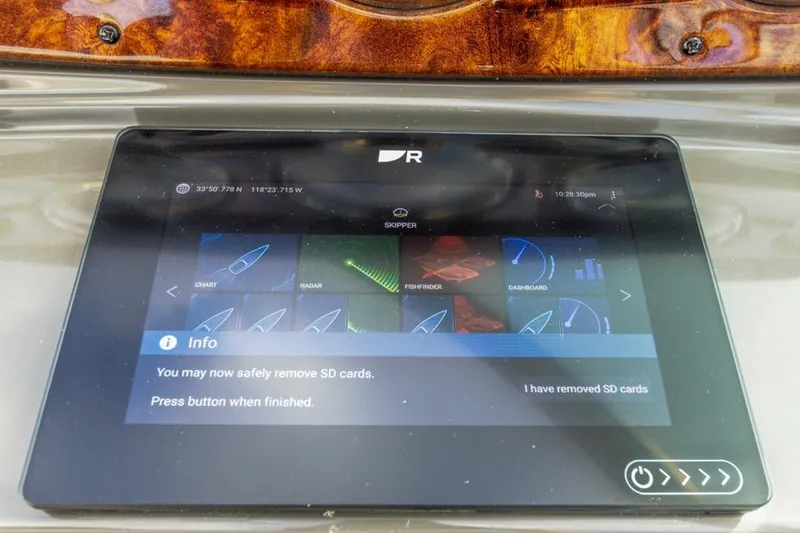 Slide: The Image of Touchscreen navigation system on 2013 Rinker 290 Express Cruiser boat. - 14