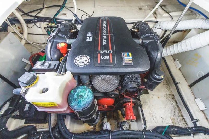 Slide: The Image of Engine compartment of 2013 Rinker 290 Express Cruiser with Volvo Penta 380 V8 engine. - 24