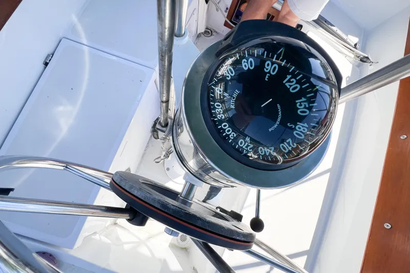 Slide: The Image of Compass on a 1978 CAL 34 sailboat, showing navigation details. - 12