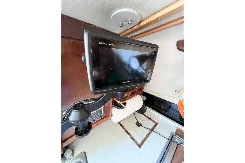 Slide: The Image of Garmin GPSMap 741xs mounted inside a 1978 CAL 34 sailboat cabin. - 44