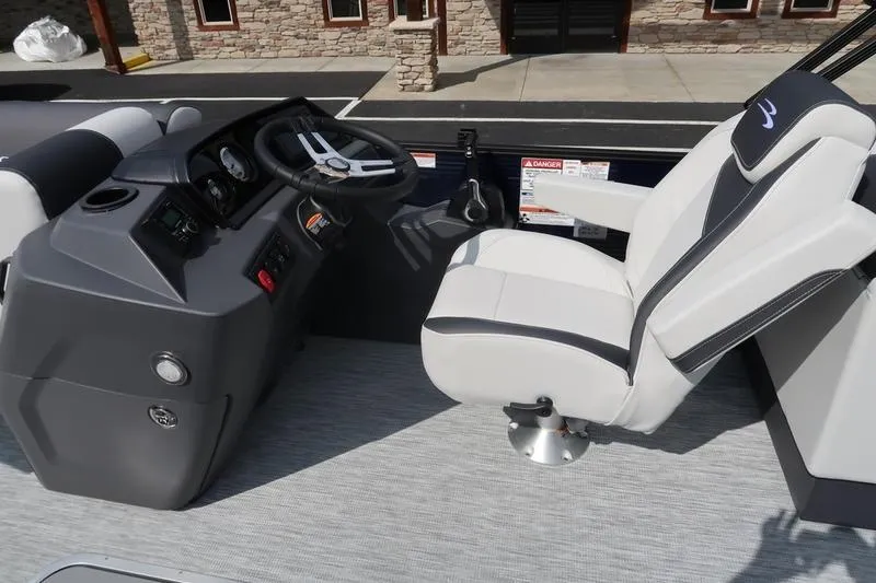 Slide: The Image of Steering console of 2026 Bennington S Quad Bench 22 SSR pontoon boat. - 16