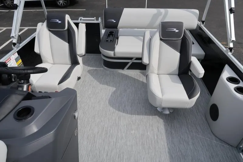 Slide: The Image of 2026 Bennington S Swingback 22 SSB boat seat, gray and white upholstery, outdoor setting. - 11