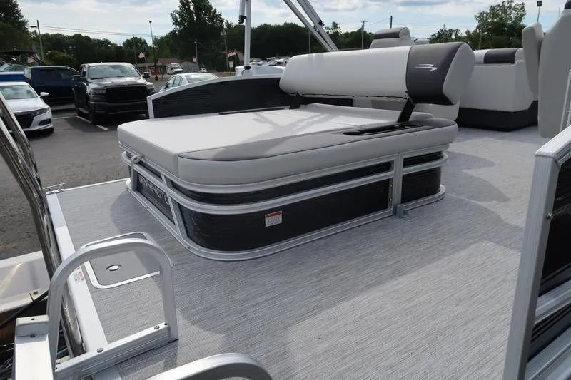 Slide: The Image of 2026 Bennington S Swingback 22 SSB pontoon boat parked at Boat Masters dealership. - 3